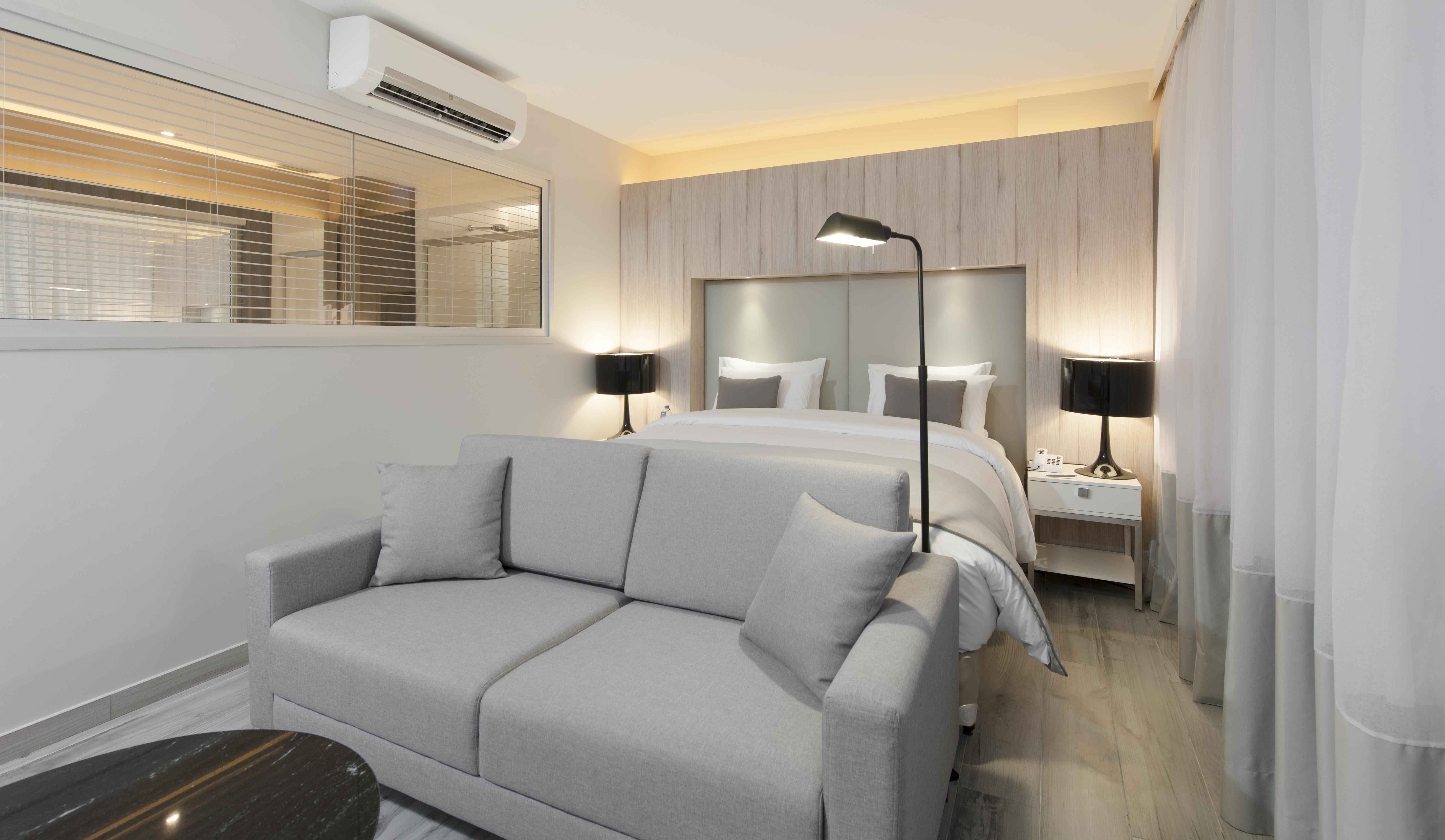 Hotel Radisson Blu Belo Horizonte Savassi Exterior foto A bedroom in a serviced apartment in Hong Kong